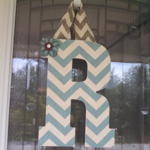 Teal Chevron Fabric Covered Letter. Letters are 13 1/2 inches tall with added decor piece and burlap hanger. Decor piece can be customized upon request!