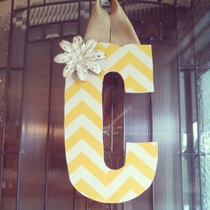 Yellow Chevron Fabric Covered Letter. Letters are 13 1/2 inches tall with added decor piece and burlap hanger. Decor piece can be customized upon request!