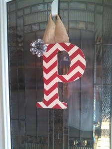 Red Chevron Fabric Covered Letter. Letters are 13 1/2 inches tall with added decor piece and burlap hanger. Decor piece can be customized upon request!