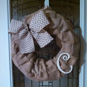 Perfect year round wreath. It is brown burlap with a white chevron bow and letter!