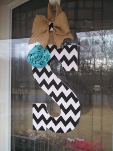 Black Chevron Fabric Covered Letter. Letters are 13 1/2 inches tall with added decor piece and burlap hanger. Decor piece can be customized upon request!