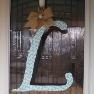 Teal Design Fabric Covered Letter. Letters are 18 inches tall with added decor piece and burlap hanger. Decor piece can be customized upon request!